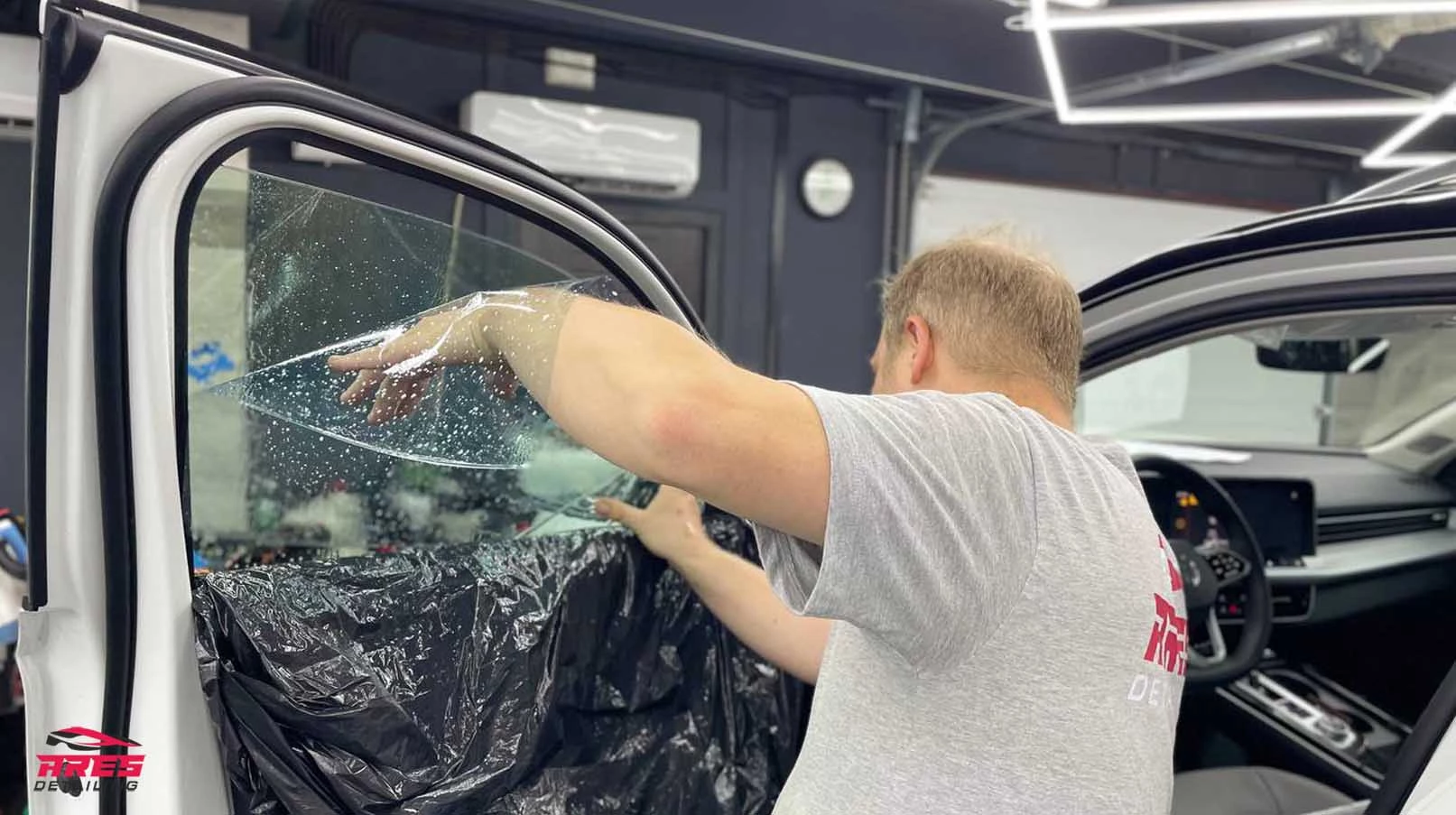 Тонировка стекол автомобиля VW Tavendor