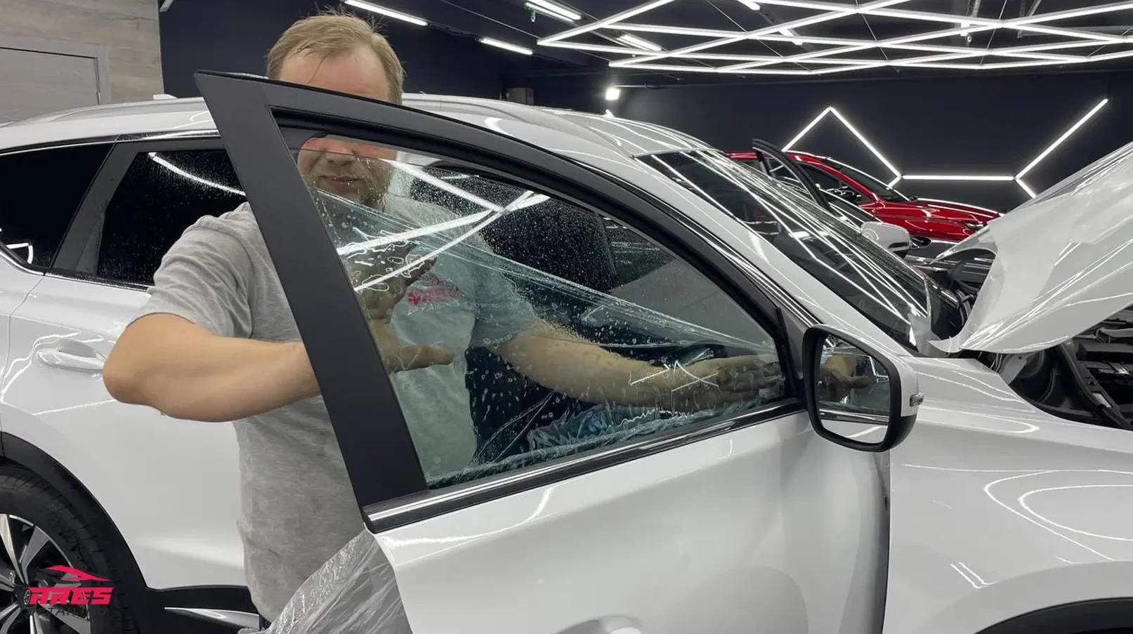 Тонировка стекол автомобиля X-Cross 7