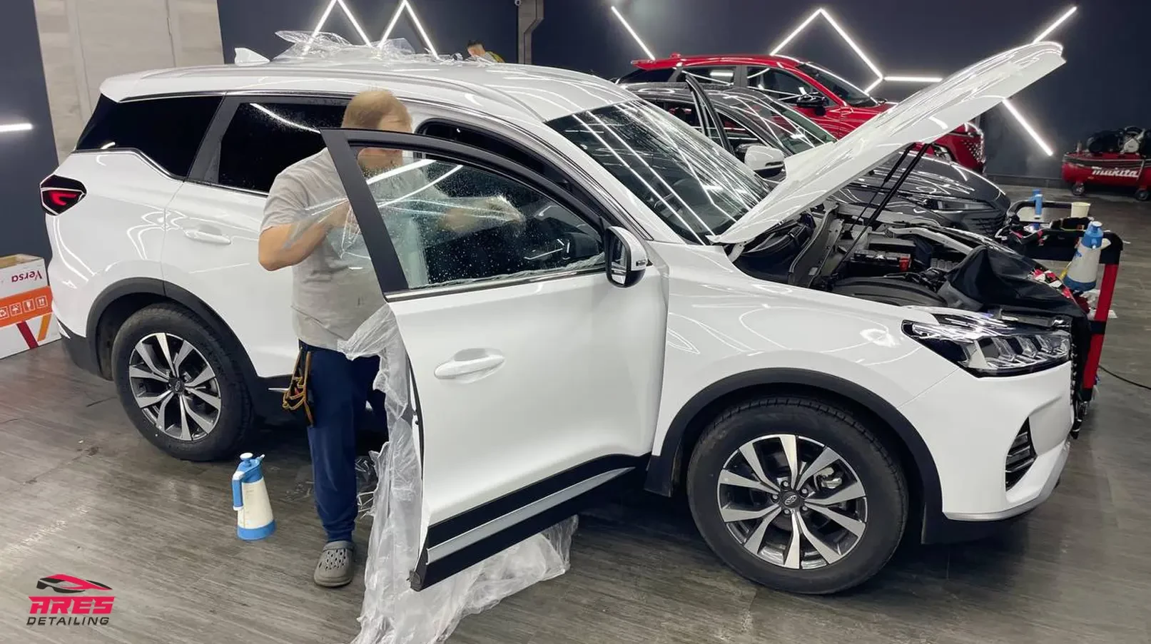 Тонировка стекол автомобиля X-Cross 7